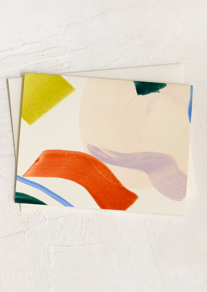 A set of blank greeting cards with colorful abstract pattern on front.