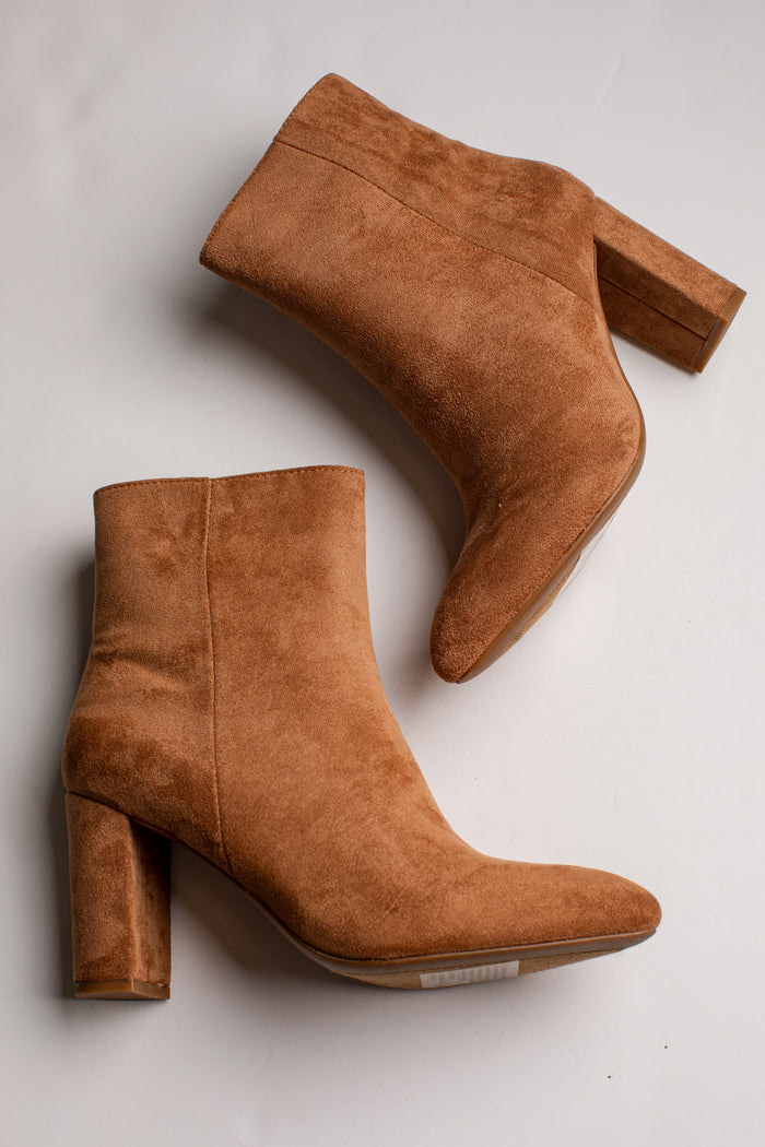 A pair of women's ankle boots in tan suede with chunky block heels, shown from two angles on a light gray background.
