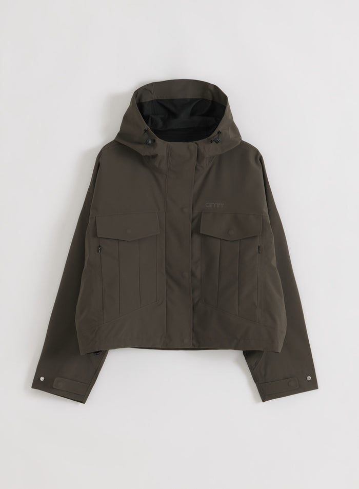 Tummanvihreä Dark Ivy Waterproof Jacket -takki litteänä kuvausnäkymänä