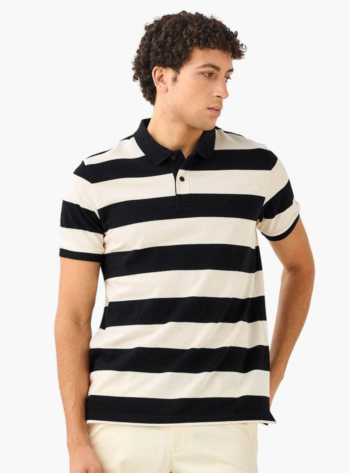 Striped polo shirt on model – Dubai casual wear